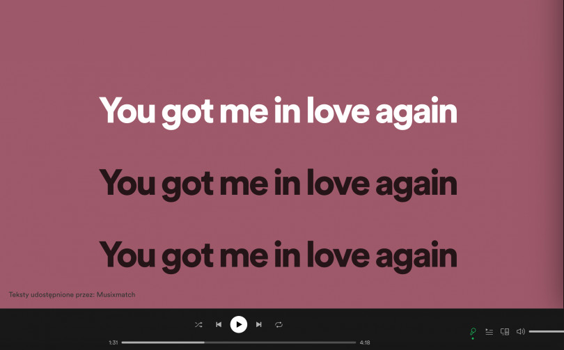 zrzut ekranu prezentujący opcję „Lyrics" na Spotify: kadr prezentuje słowa piosenki „Love Again" Dua Lipy  