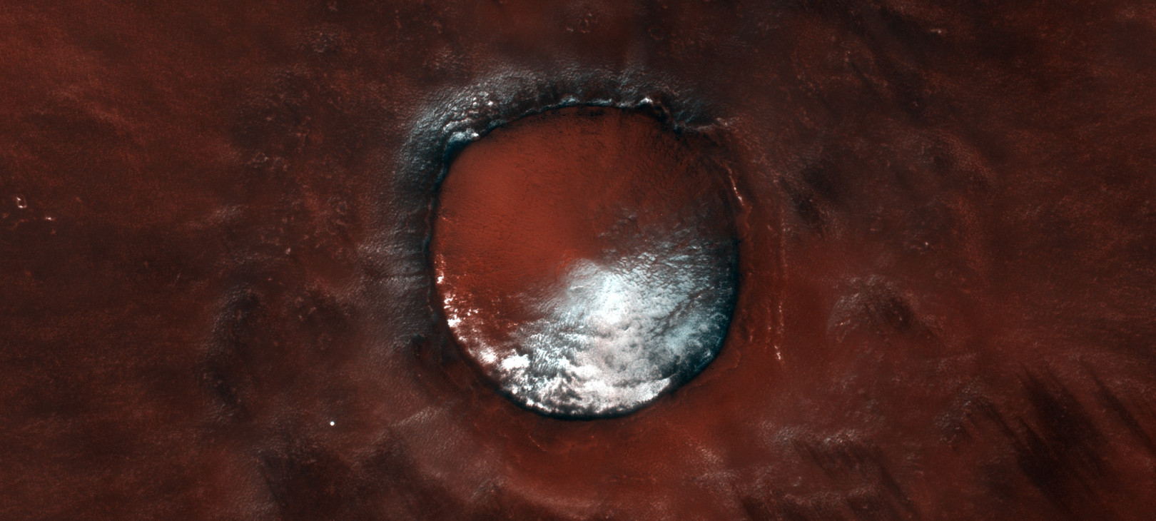 marsjański krater w rejonie Vasitas Borealis / fot. ESA / Roscosmos / CaSSIS